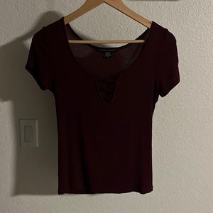 Maroon/purple t-shirt. Crisscross front style. Casual. XS.
